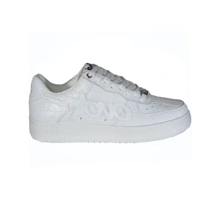 White leather Bathing Ape Bapesta OVO sneaker with a thick sole for stylish athletic wear