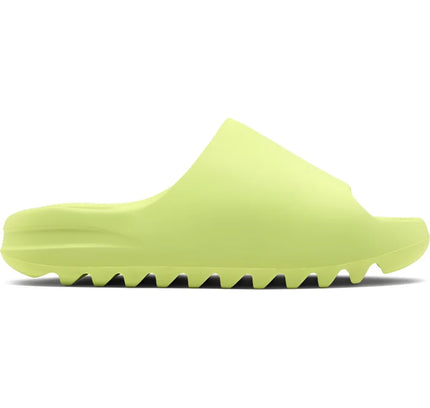 Neon yellow adidas Yeezy Slide with a ridged sole in Glow Green style