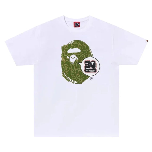 White BAPE 30th Anniversary Ape Head Tee with green circular ape logo design