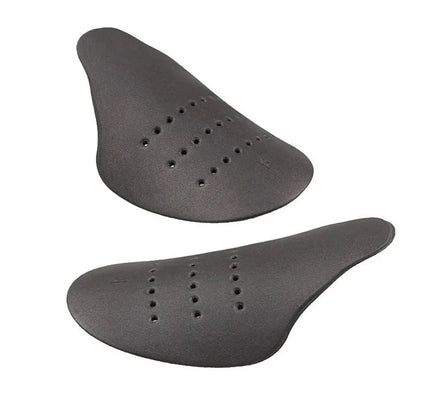 Gray bicycle seat with ventilation holes for crease protectors to prevent creases