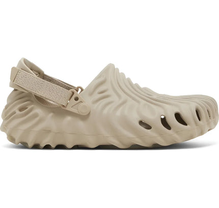Beige Crocs Pollex Clog by Salehe Bembury with wavy ridges and ventilation holes