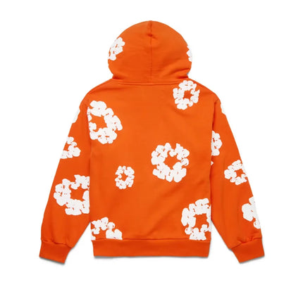 Orange hoodie with white floral pattern from Denim Tears The Cotton Wreath Sweatshirt Nike Dunk collection