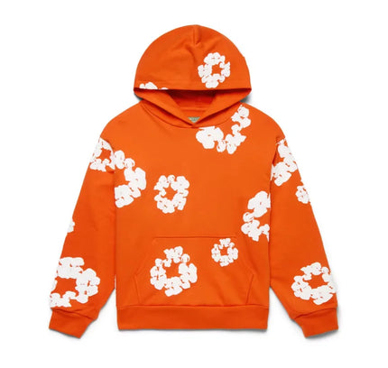 Orange hoodie with white floral pattern from Denim Tears The Cotton Wreath Sweatshirt collection