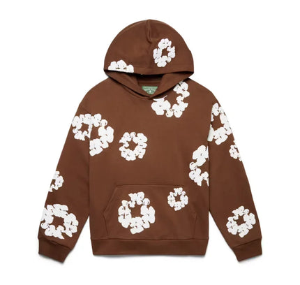 Brown hoodie with white floral pattern from Denim Tears Nike Dunk collection