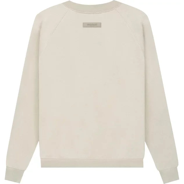 Beige Fear of God Essentials 1977 Crewneck sweatshirt featuring a small label tag