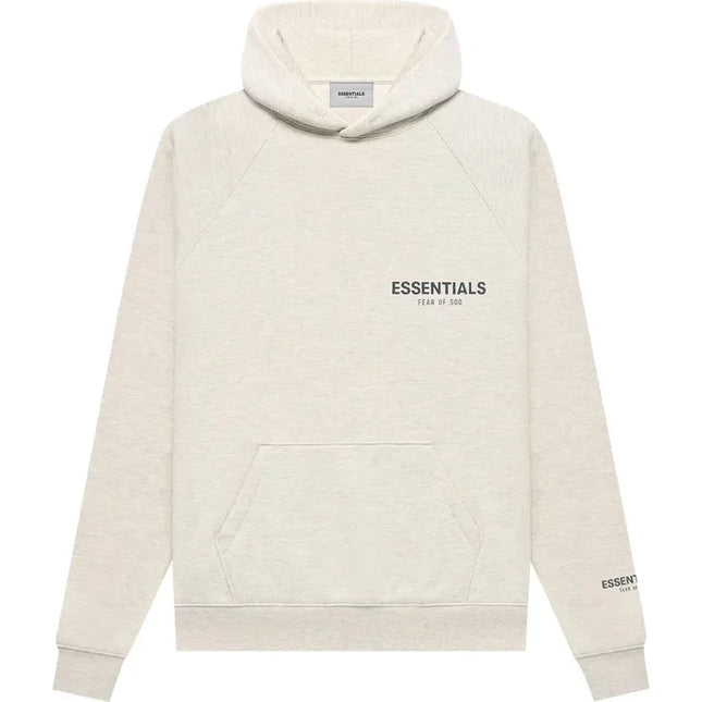 Cream-colored God Essentials pullover hoodie featuring bold ESSENTIALS branding