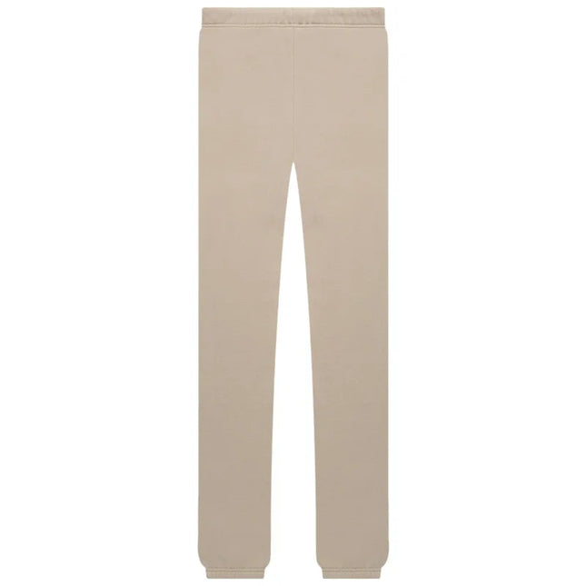 Beige Fear of God Essentials Core Collection Sweatpants with elastic cuffs at ankles