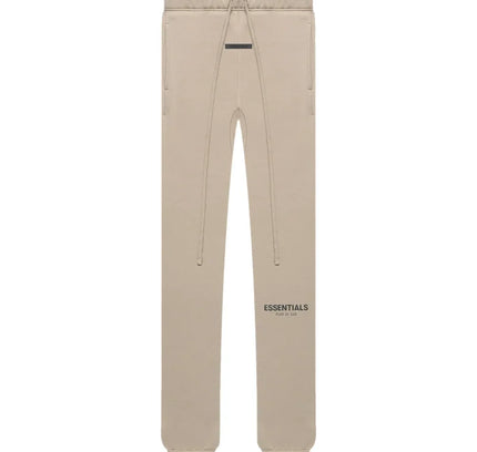 Beige Fear of God Essentials Core Collection Sweatpants with printed text on leg