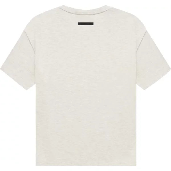 Plain cream-colored t-shirt with short sleeves from Fear of God Essentials Core Collection