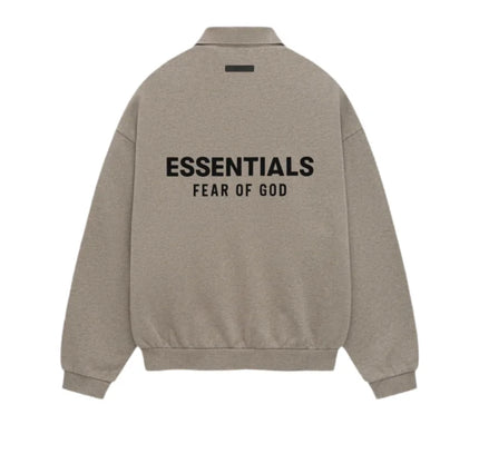 Beige Fear of God Essentials Fleece Polo featuring text on the back