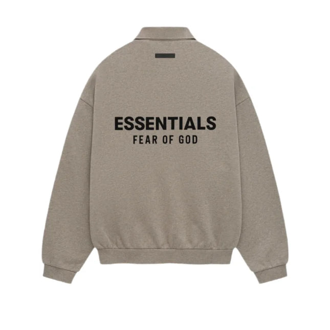 Beige Fear of God Essentials Fleece Polo featuring text on the back