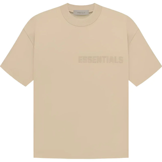 Beige Fear of God Essentials SS Tee featuring a minimalist design on the chest