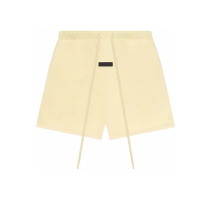 Cream-colored Fear of God Essentials Sweatshort with elasticated drawstring waist