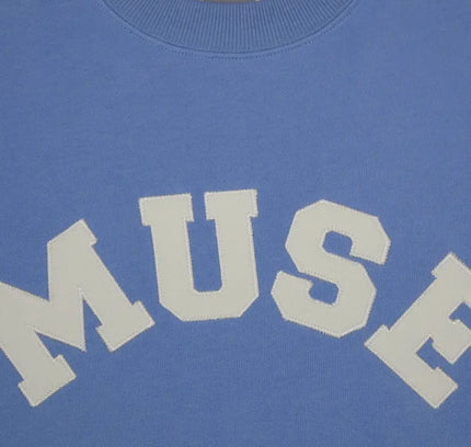 Light blue French Terry Sweatshirt with MUSE text in white cotton fabric