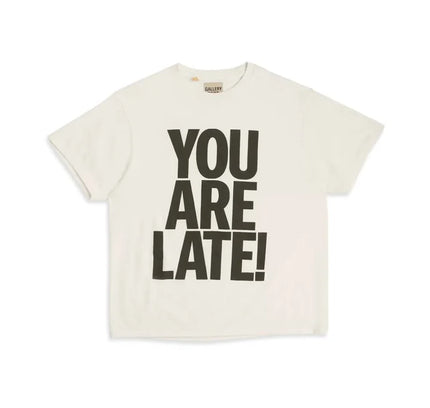 Off-white T-shirt with YOU ARE LATE! text featuring Nike Dunk, Jordan 4, and low Dunks Nike