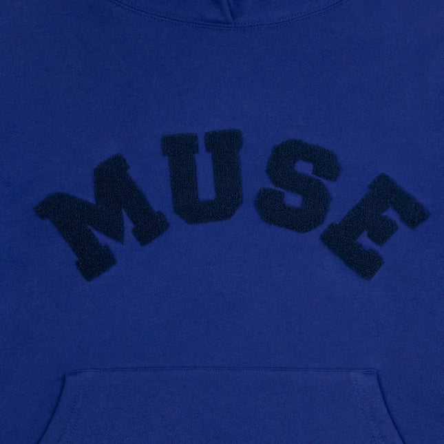 Royal blue Chenille Heavyweight Hoodie with MUSE text in navy lettering, a wardrobe essential