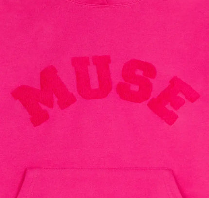 Hot pink chenille heavyweight hoodie with MUSE text across the chest