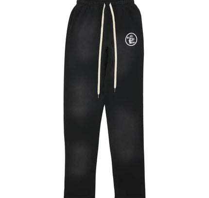 Black Los Angeles men’s sweatpants with white drawstring and circular logo in milled fleece