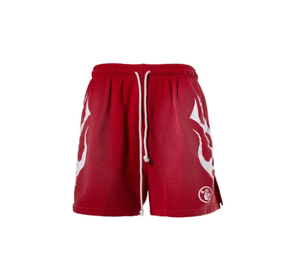 Red athletic Shorts with white flame design from Hellstar Flame Shorts collection