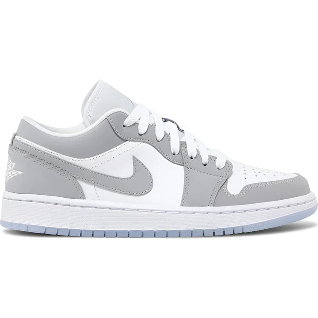 Nike Air Jordan 1 Low Wolf Grey sneaker showcasing a timeless silhouette in white and grey