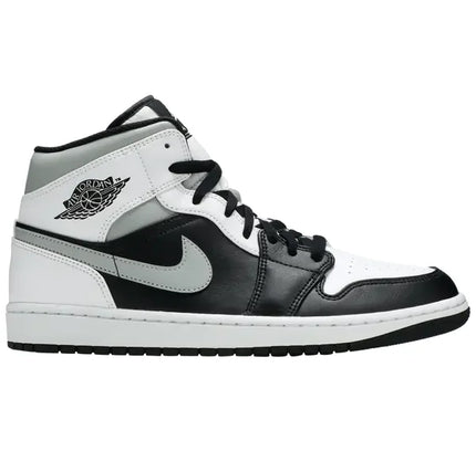 Black, white, and grey leather Air Jordan 1 Mid White Shadow sneakers