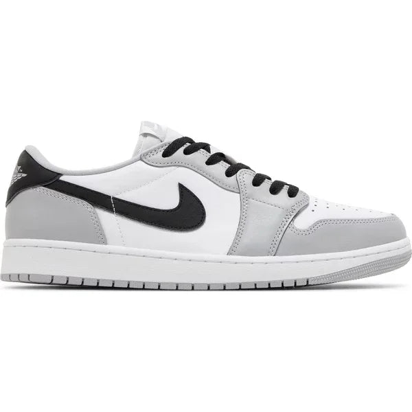 Air Jordan 1 Retro Low OG Barons in white, grey, and black inspired by Michael Jordan’s time