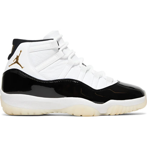 Air Jordan 11 Retro DMP Defining Moments in white and black with patent leather detailing