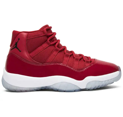 Red Air Jordan 11 Retro Win Like 96 basketball shoe with white midsole and grey outsole