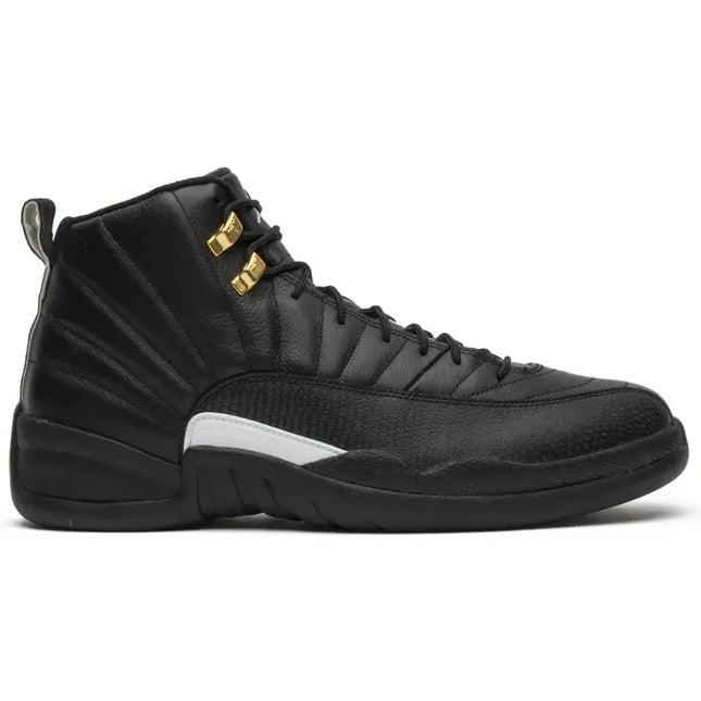 Black and white Air Jordan 12 Retro The Master sneaker with metallic gold accents