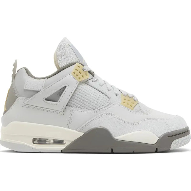 White and grey Air Jordan 4 Retro SE Craft Photon Dust with pale yellow accents