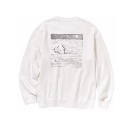 White KAWS x Uniqlo Longsleeve Sweatshirt featuring a swimming elephant art design