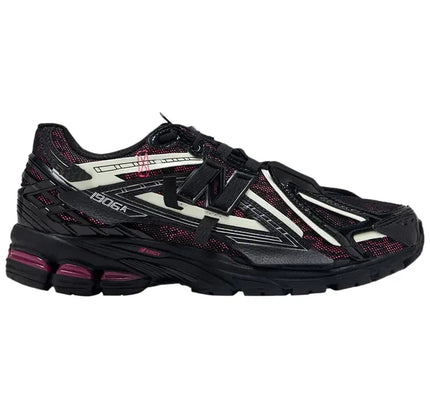 New Balance 1906A Black Pink athletic sneaker with white accents for active wear