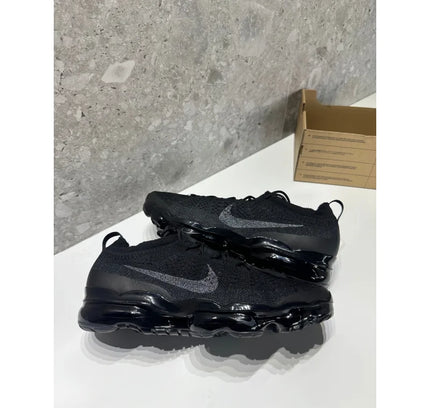 Pair of black Nike Air VaporMax sneakers from NO LID Nike Air VaporMax 2023 Flyknit collection