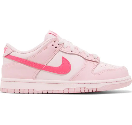 Pink and white Nike Dunk Low sneaker with coral swoosh for retro Nike basketball style