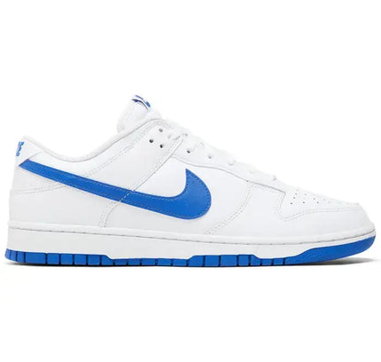 White Nike Dunk Low with blue swoosh and outsole in Hyper Royal colorway