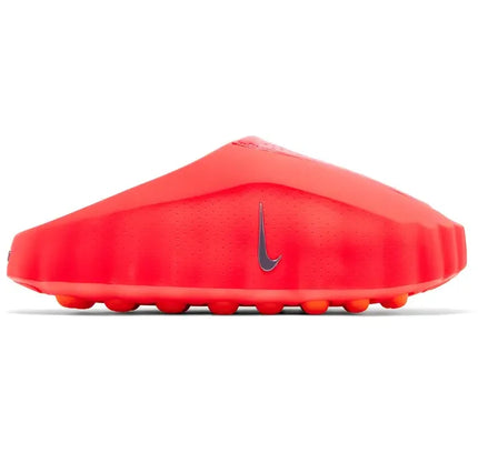 Vibrant red nike mind 001 slide solar red women’s football cleat with sleek perforated upper and orange studs