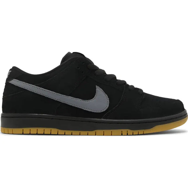 Black Nike SB Dunk Low Fog sneaker with grey swoosh and gum sole for skateboarding