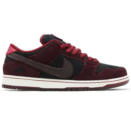 Burgundy and black Nike SB Dunk Low Riot Skateshop sneaker for stylish skating