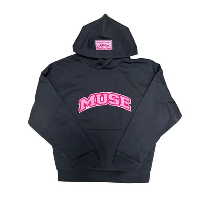 Black hoodie sweatshirt featuring pink MUSE text, perfect for a classic hoodie look