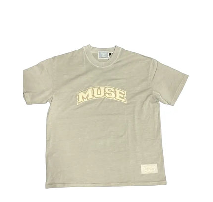 Beige OG Patch T-Shirt featuring MUSE text, perfect with Nike Dunk or Jordan 4 shoes