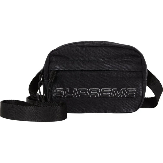 Black Supreme shoulder bag with embossed logo, zip pocket, textured finish, perfect for low dunks Nike style