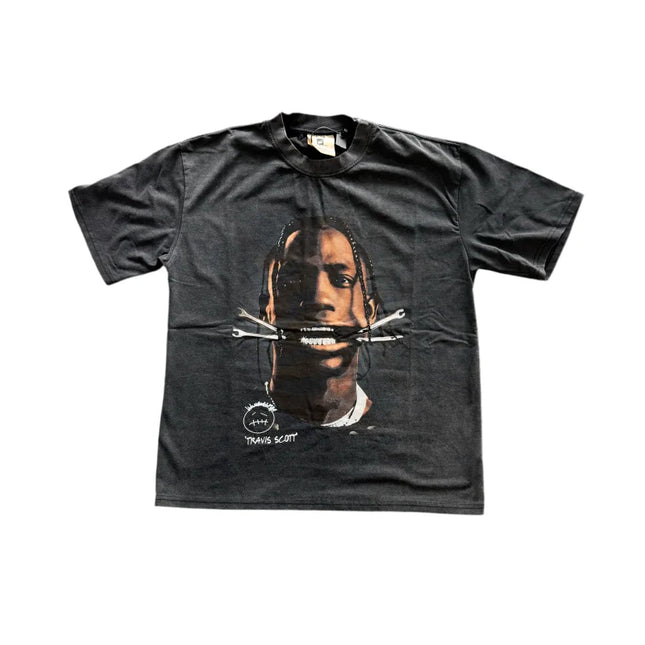 Black T-shirt featuring Travis Scott face graphic print and modern arrows design